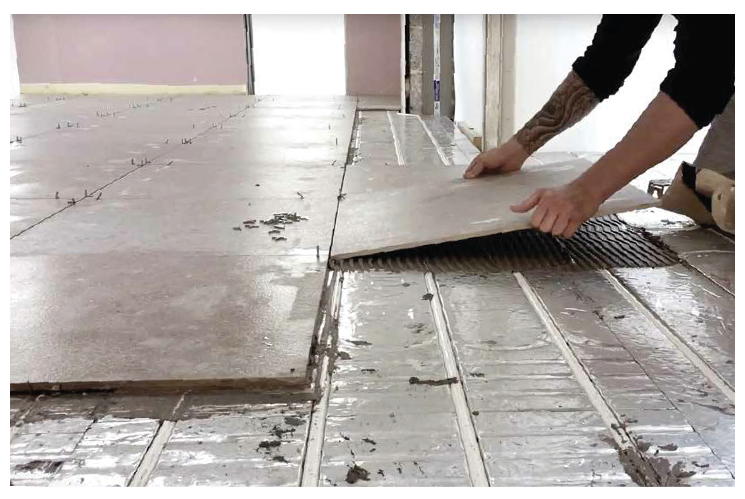 Tiles going down on Wunda Underfloor heating panels