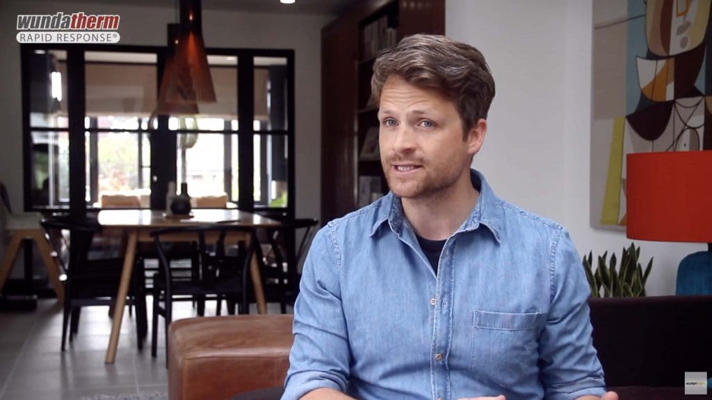 A picture from a video where you can see how WundaFloor transformed Ben Hillman's home.