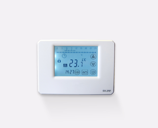 A room thermostat that has a digital display and is wireless
