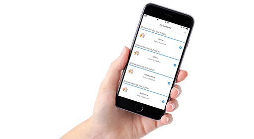 a hand holding a smartphone with the my systems page of the WundaSmart app open