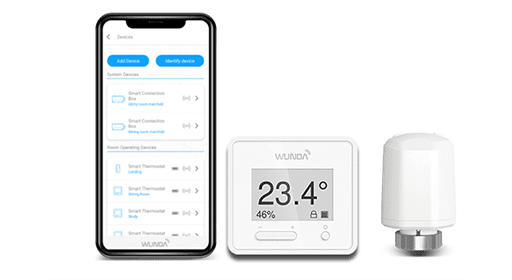 A phone displaying the WundaSmart app beside a WundaSmart Thermostat and a radiator head