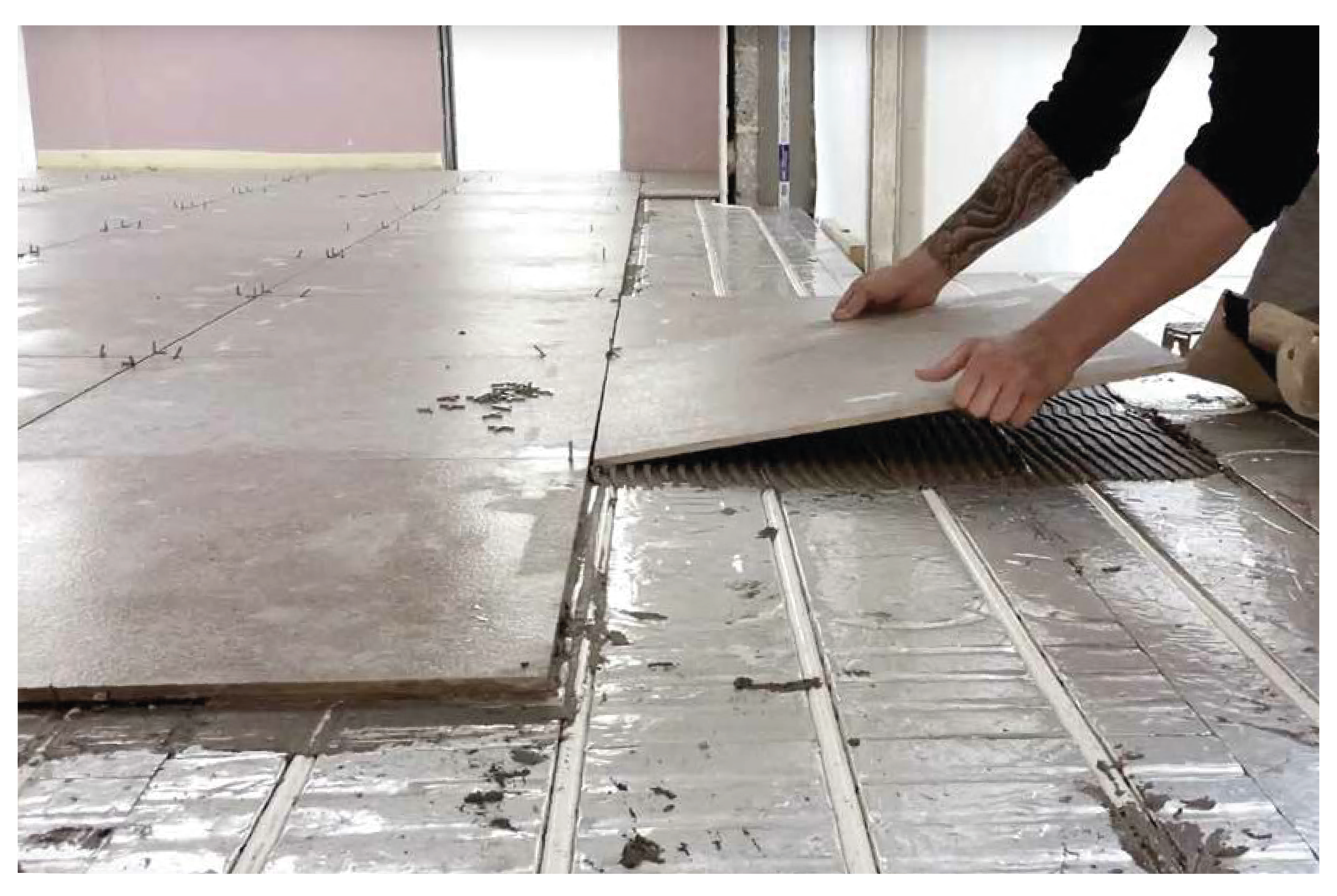 Tiles going down on Wunda Underfloor heating panels